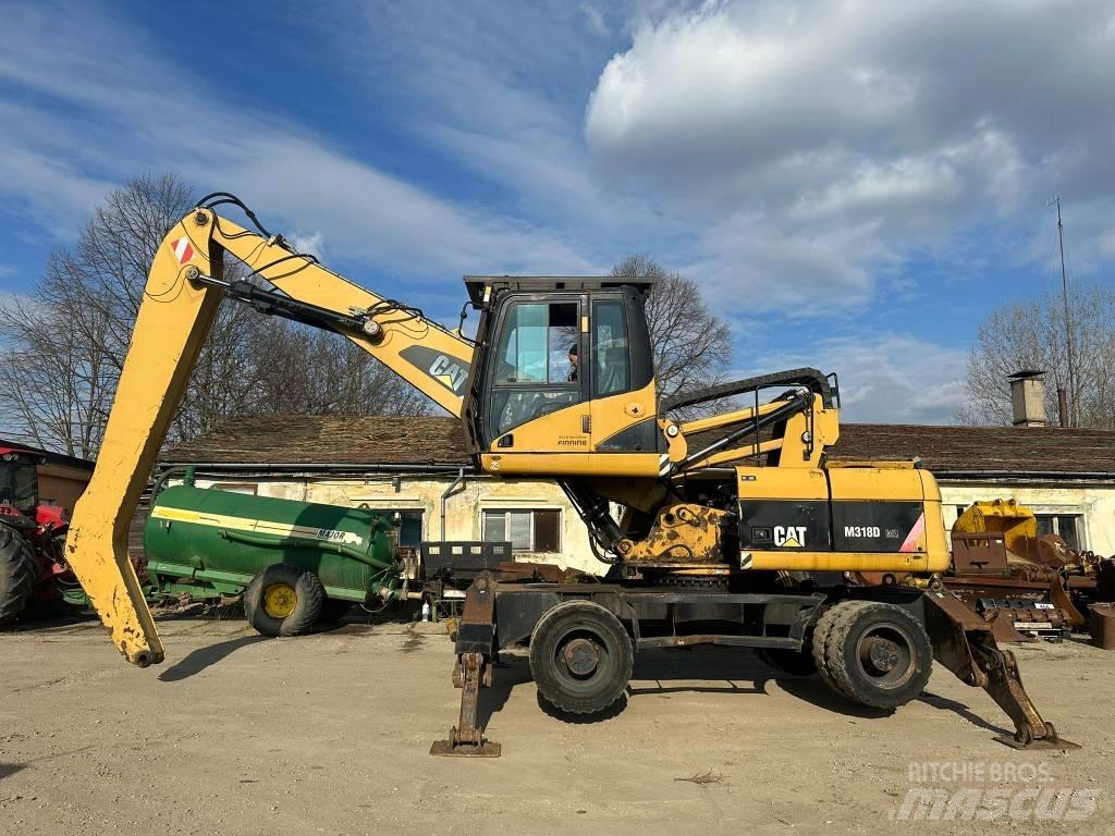 CAT M 318 D MH مناولات المخلفات / مناولات صناعية