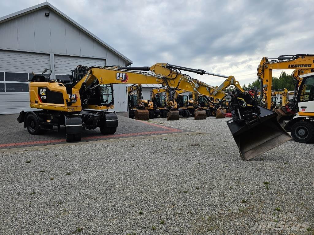 CAT M 315 F حفارات بعجل