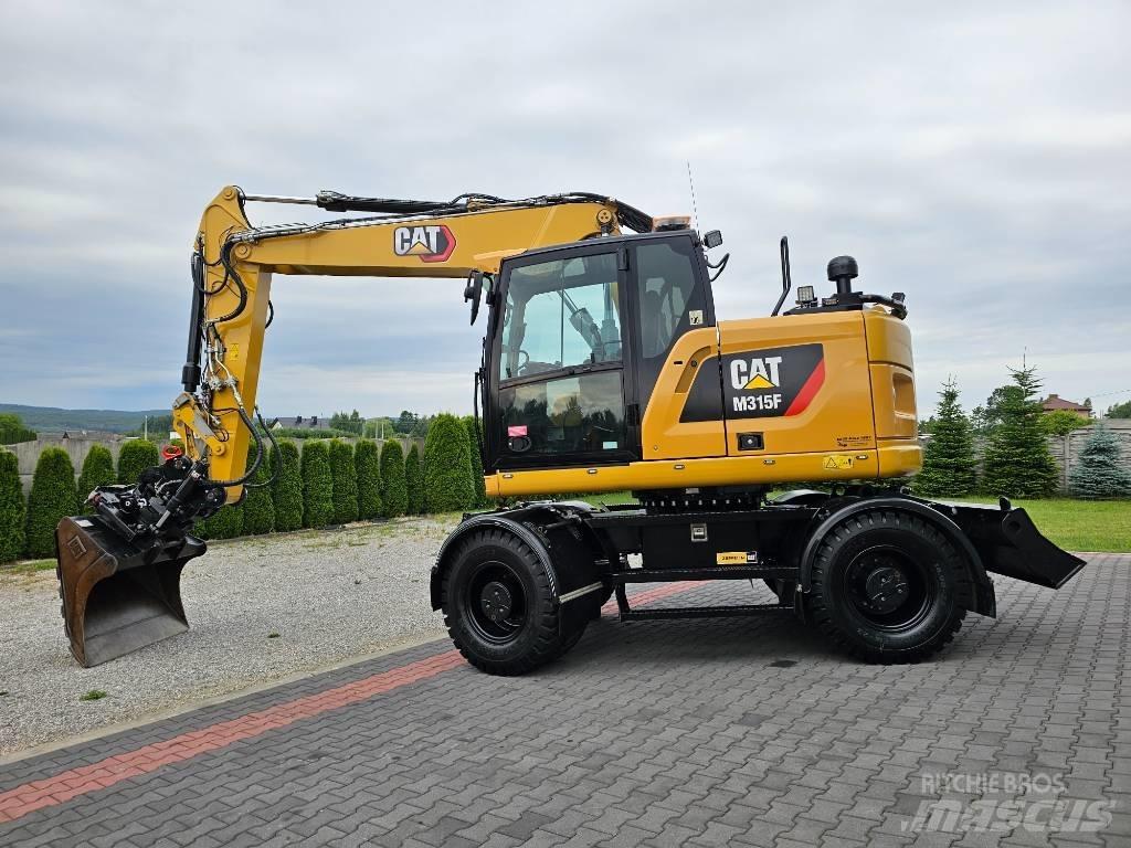CAT M 315 F حفارات بعجل