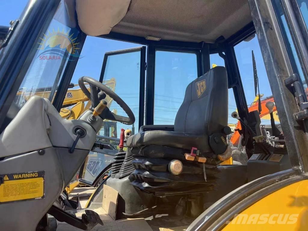 JCB 4CX لوادر ذات جرافات عكسية