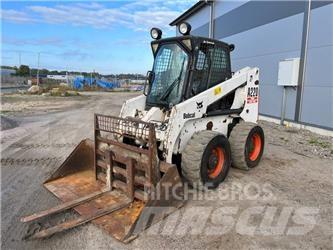 Bobcat A 220 لوادر انزلاقية التوجيه