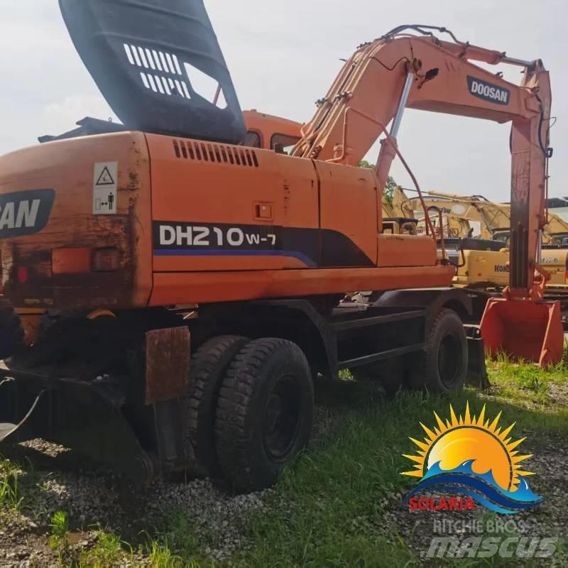 Doosan DH 210 W حفارات بعجل