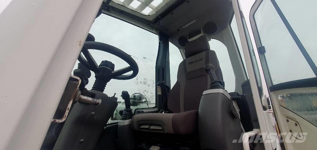 Mecalac 714MWE حفارات بعجل