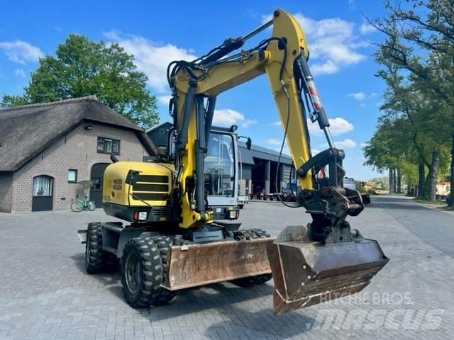 Neuson 9503 حفارات بعجل