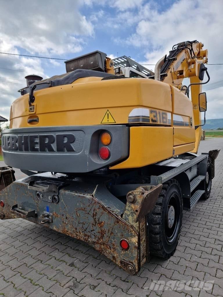 Liebherr 316 حفارات بعجل