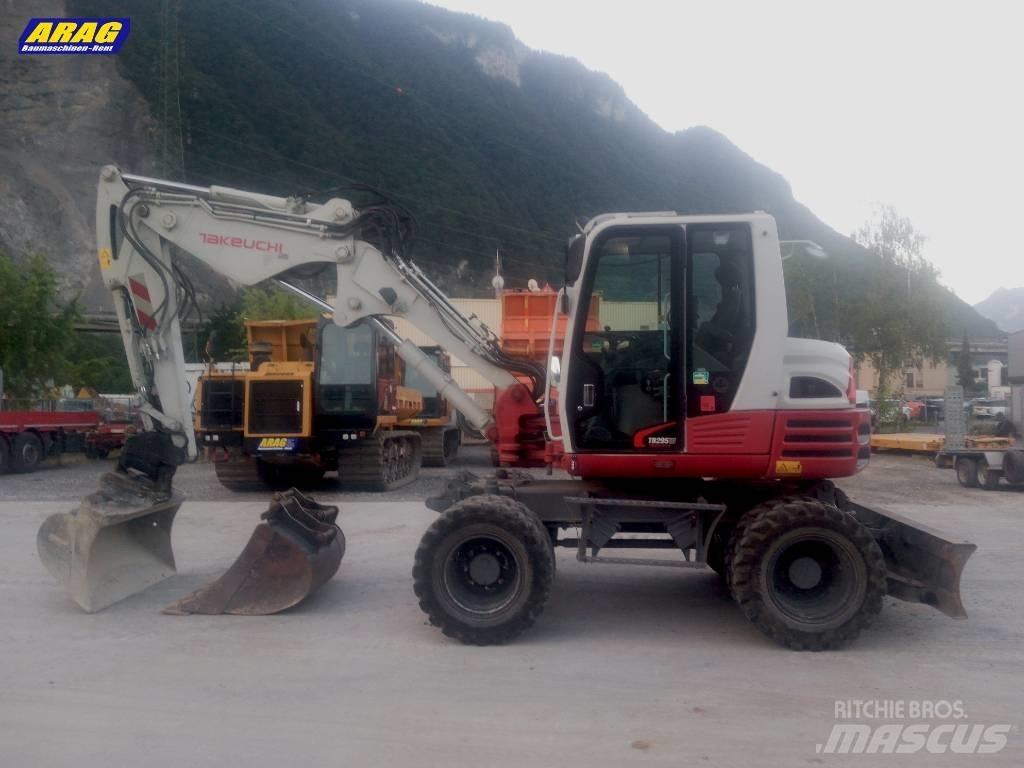 Takeuchi TB 295 W حفارات بعجل