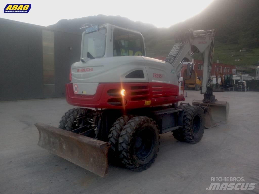 Takeuchi TB 295 W حفارات بعجل