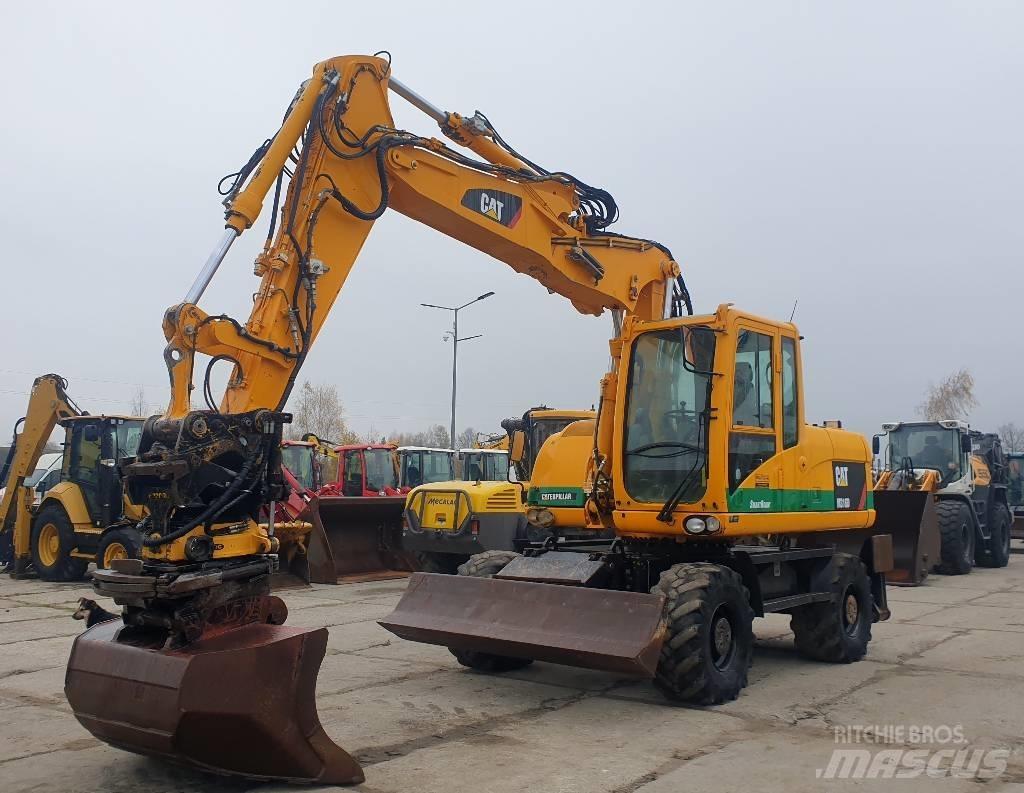 CAT M 316 D حفارات بعجل