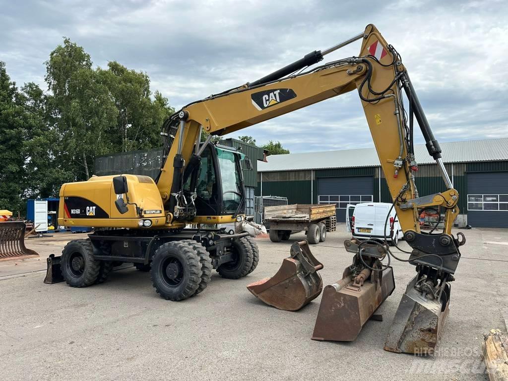 CAT M 316 D حفارات بعجل