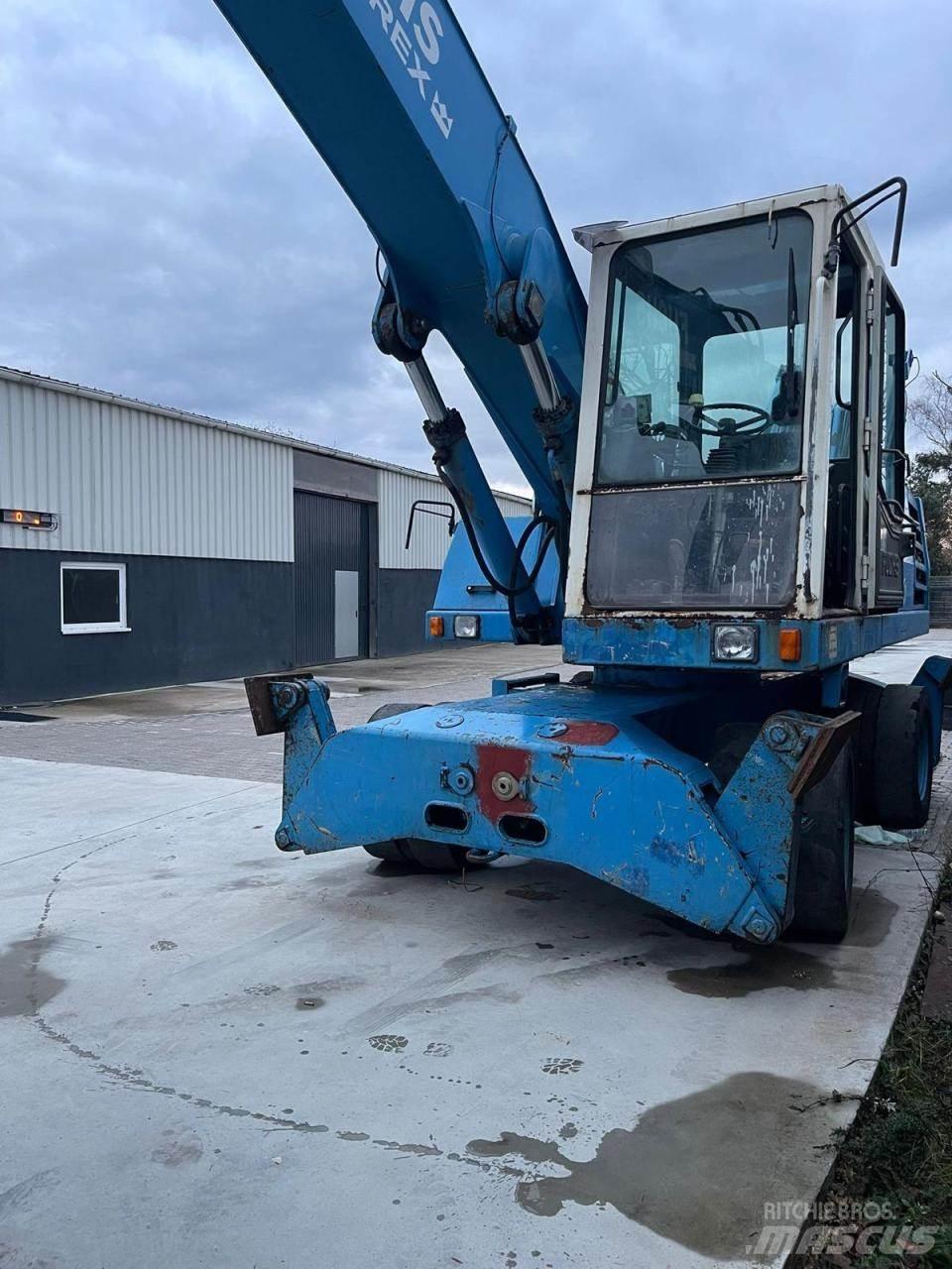 Fuchs MHL 331 حفارات بعجل