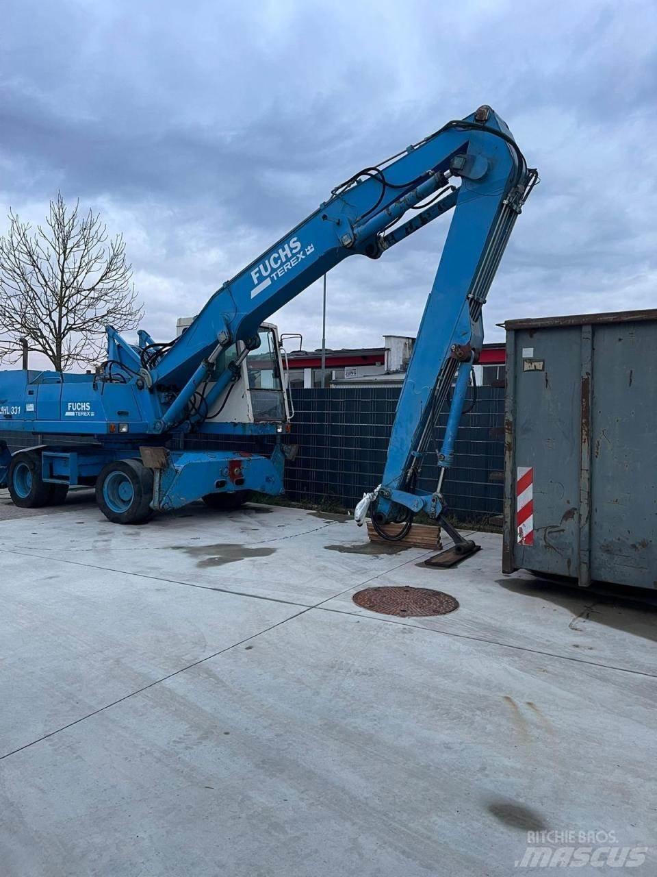 Fuchs MHL 331 حفارات بعجل