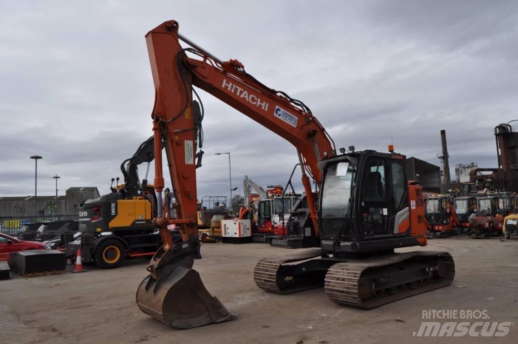Hitachi ZX 135 US-7 حفارات زحافة
