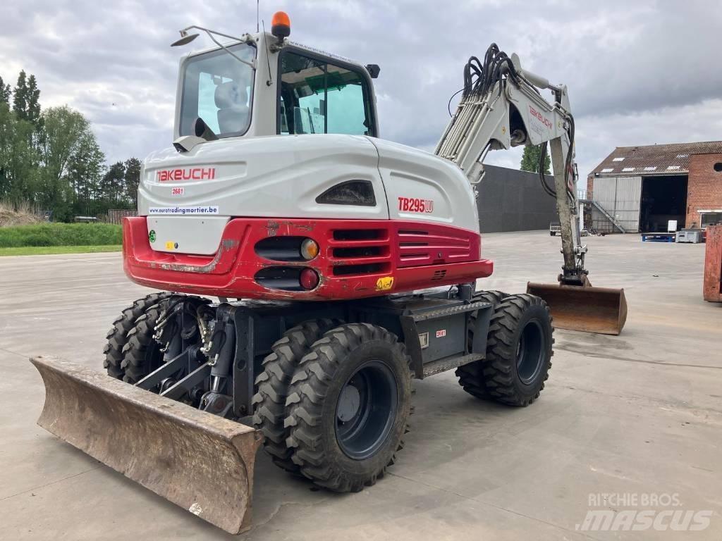 Takeuchi TB 295 W حفارات بعجل