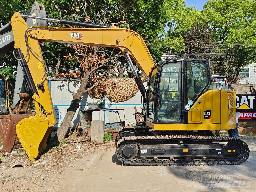 CAT 310 حفارات زحافة