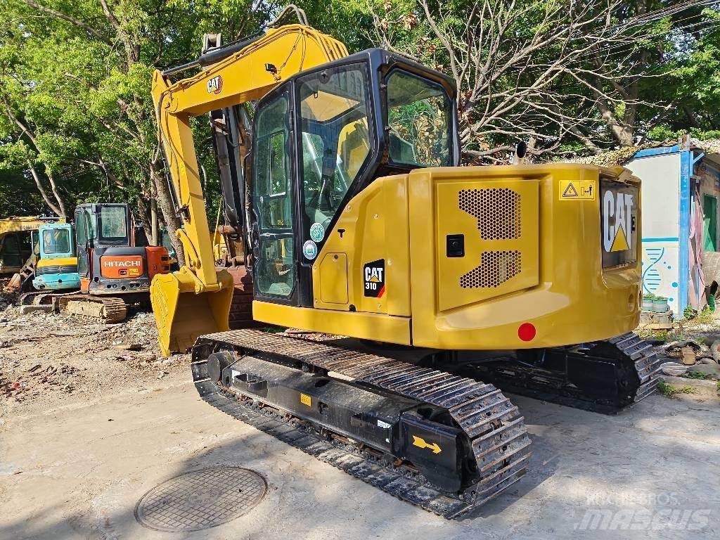 CAT 310 حفارات زحافة
