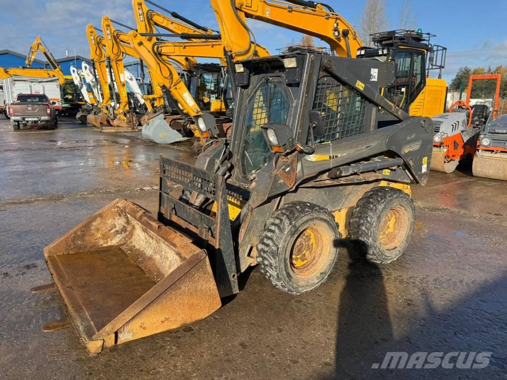 New Holland LS 170 لوادر انزلاقية التوجيه