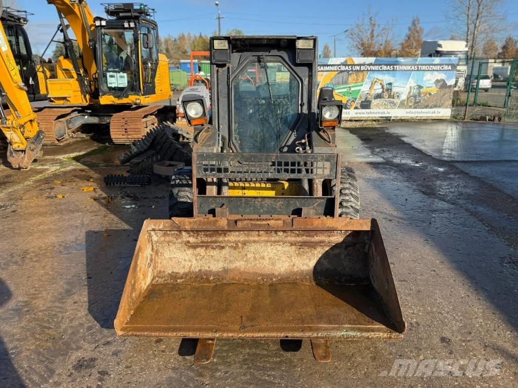 New Holland LS 170 لوادر انزلاقية التوجيه