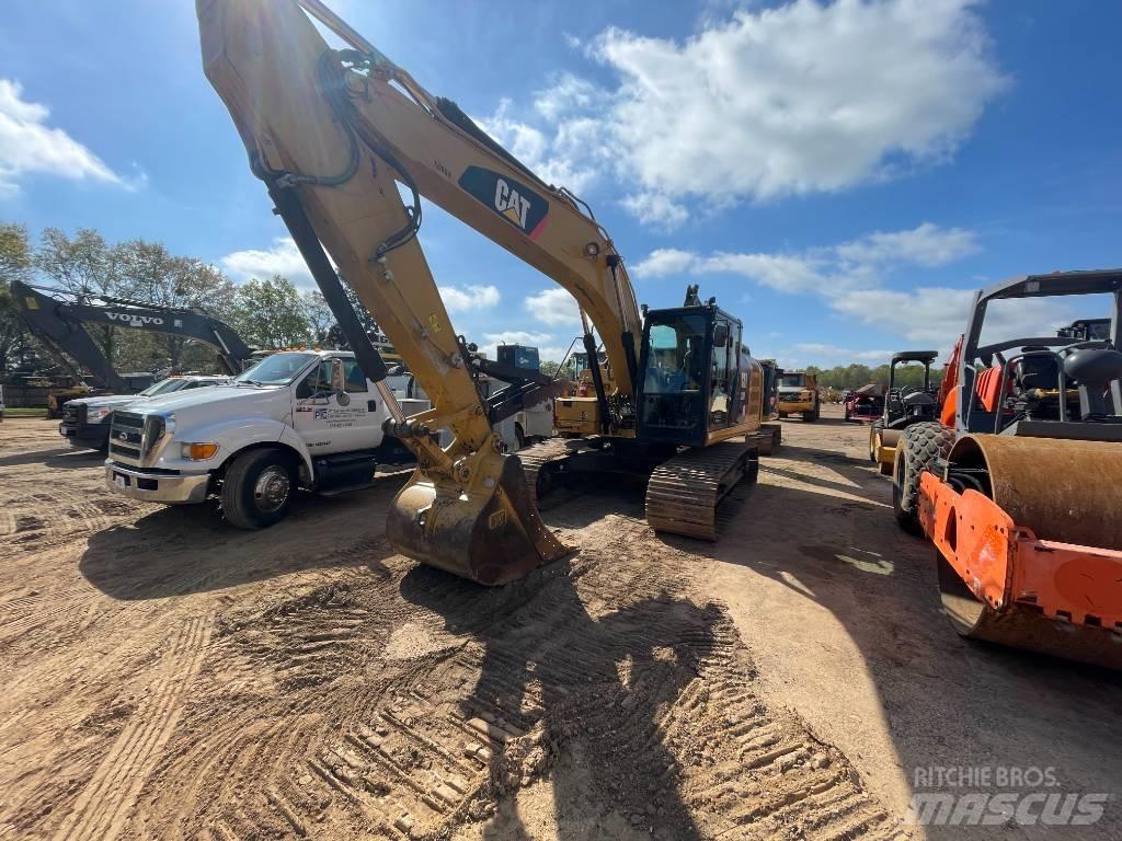 CAT 320fl حفارات زحافة