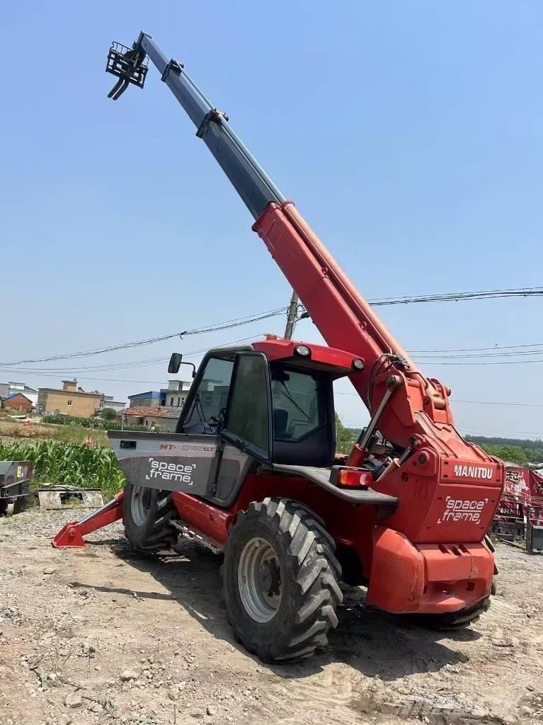 Manitou MT 1740 SL T لوادر انزلاقية التوجيه