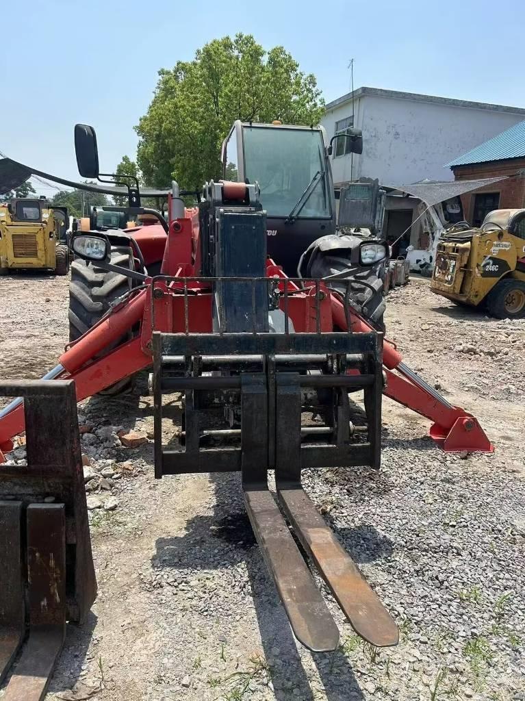 Manitou MT 1740 SL T لوادر انزلاقية التوجيه
