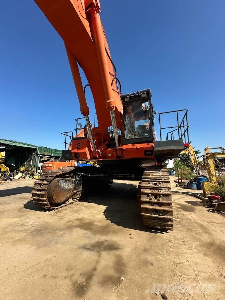 Hitachi EX 1200 حفارات زحافة