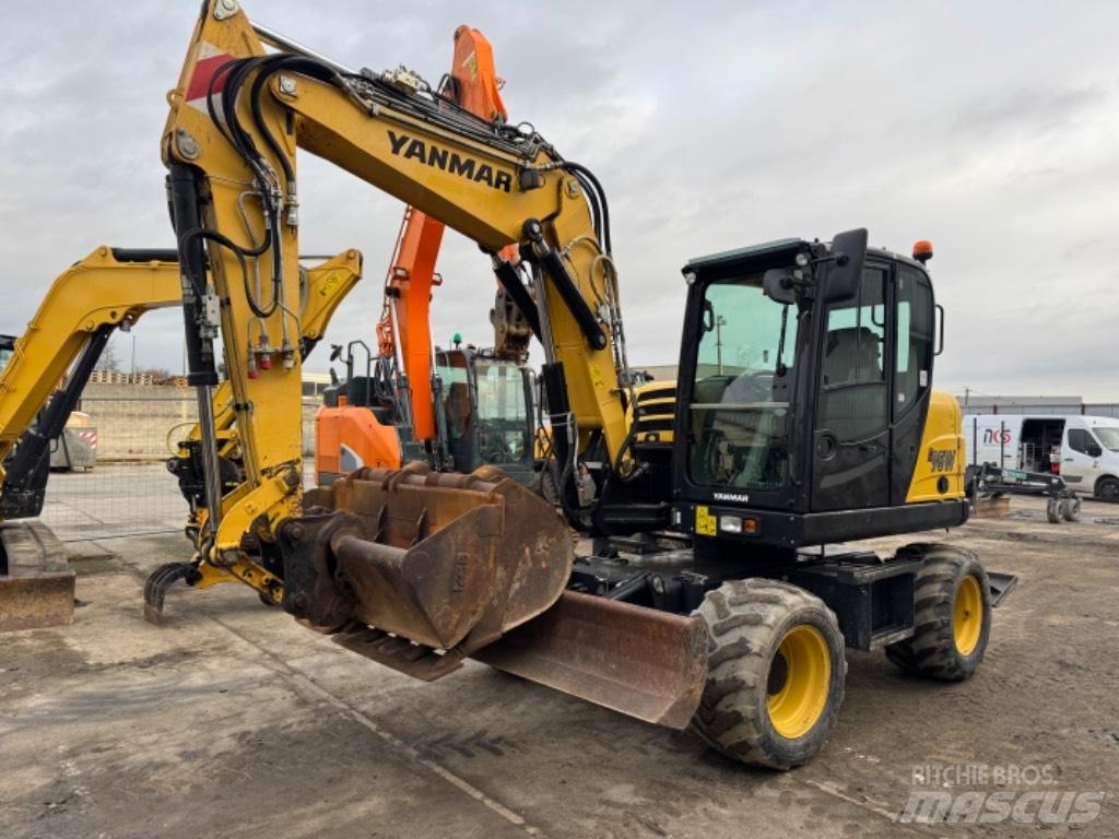 Yanmar B95W (40667) حفارات بعجل