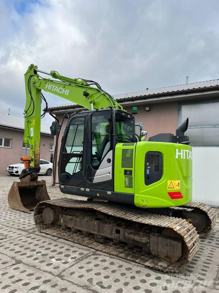 Hitachi ZX 135 US-6 حفارات زحافة