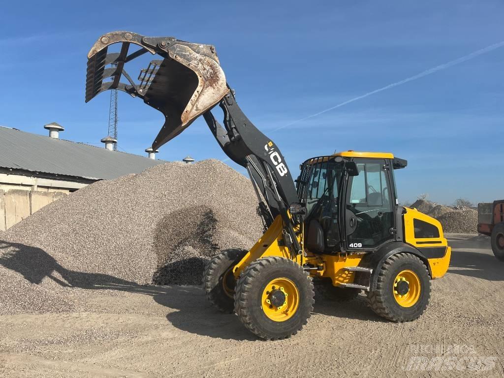 JCB 409 T4 لوادر بعجل