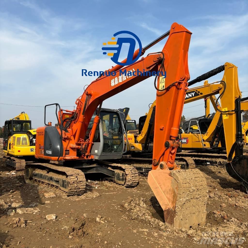 Hitachi ZX 135 US حفارات زحافة