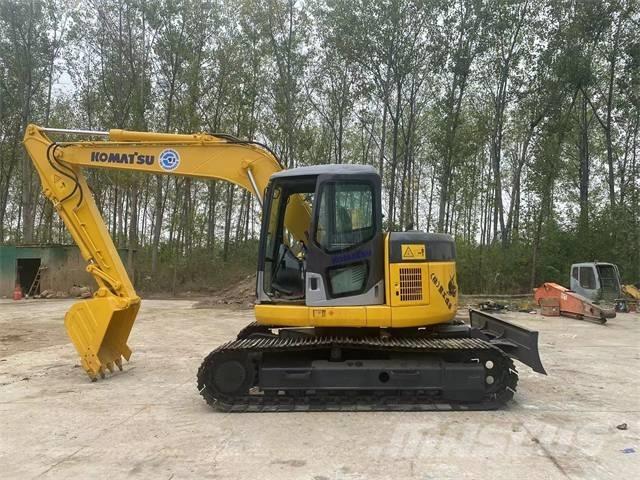 Komatsu PC128US حفارات زحافة