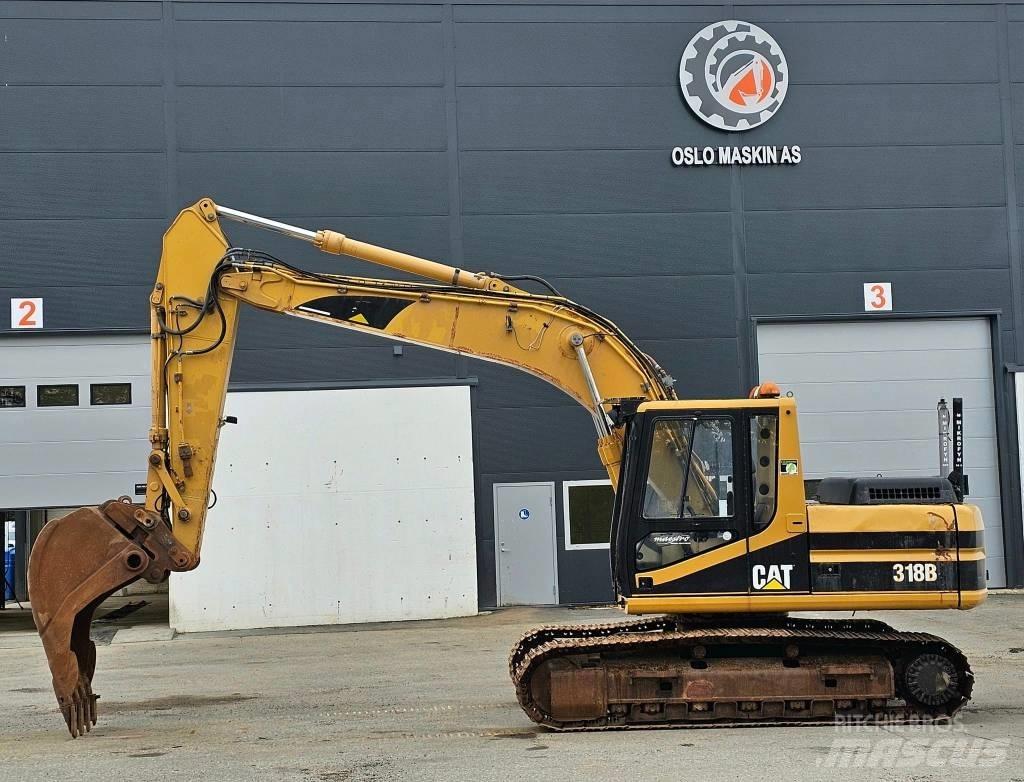 CAT 318 B L حفارات زحافة