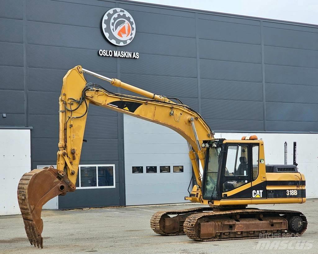 CAT 318 B L حفارات زحافة