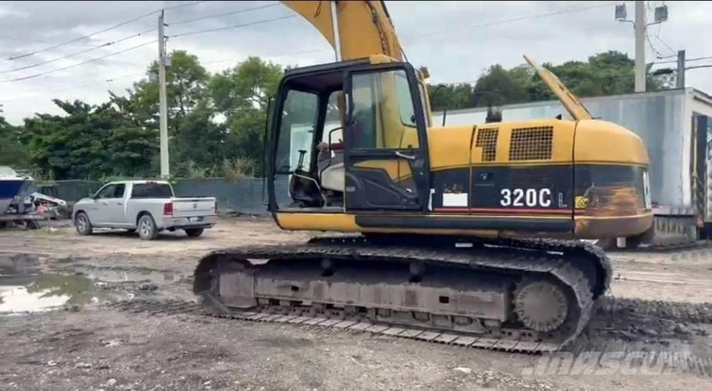 CAT 320 C L حفارات زحافة