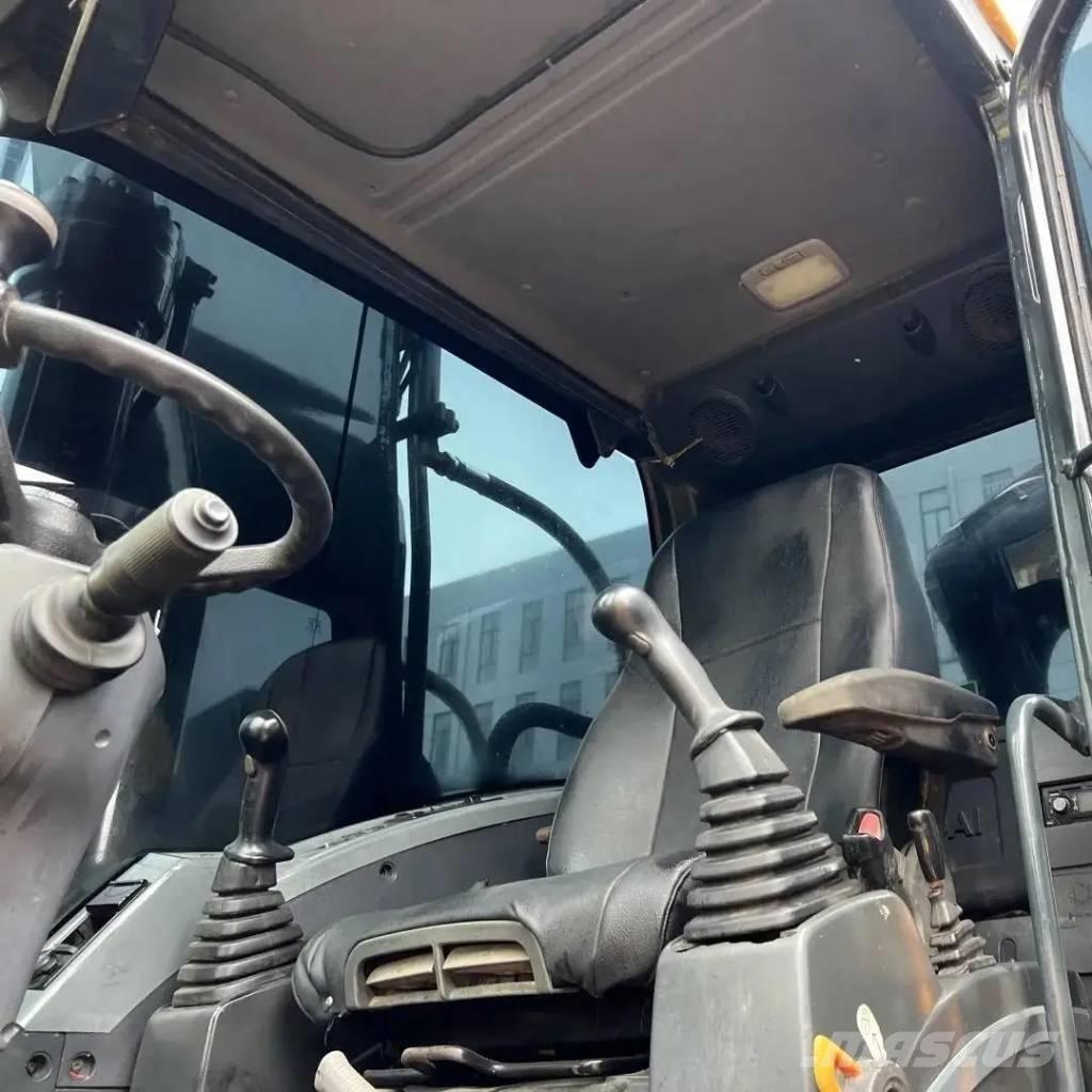 Hyundai R210W-9T حفارات بعجل