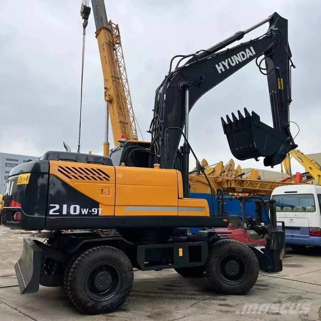 Hyundai R210W-9T حفارات بعجل