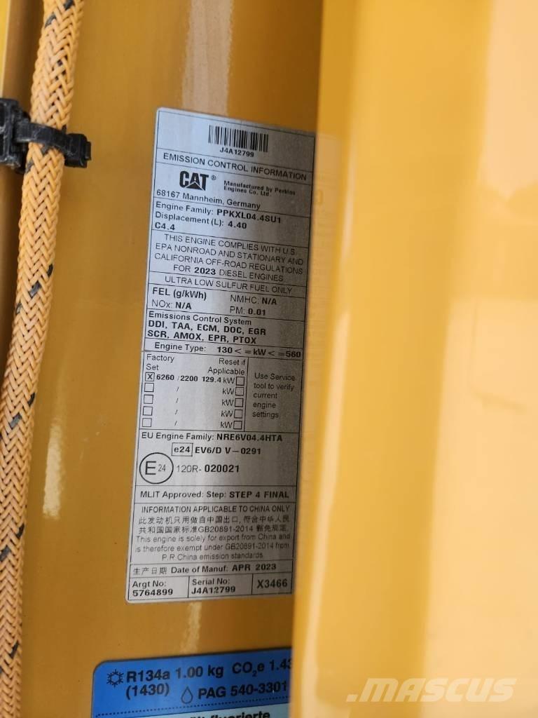 CAT M 318 حفارات بعجل
