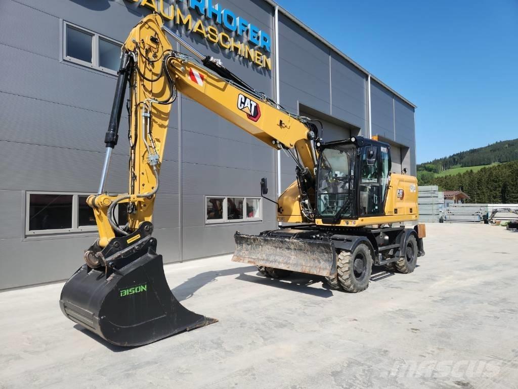 CAT M 318 حفارات بعجل