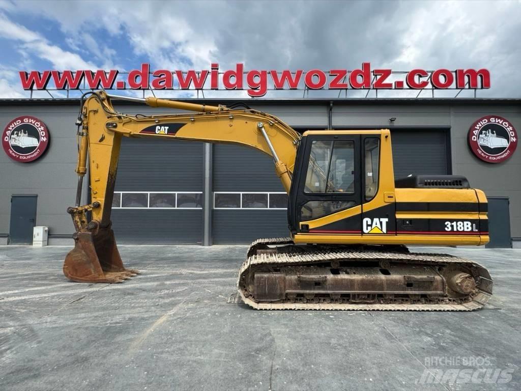 CAT 318 B L حفارات زحافة