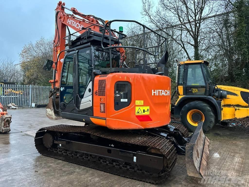 Hitachi ZX 135 US-6 حفارات زحافة