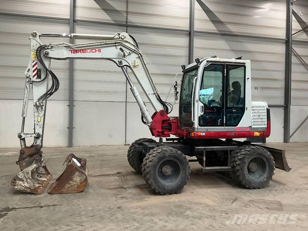 Takeuchi TB 175 W حفارات بعجل
