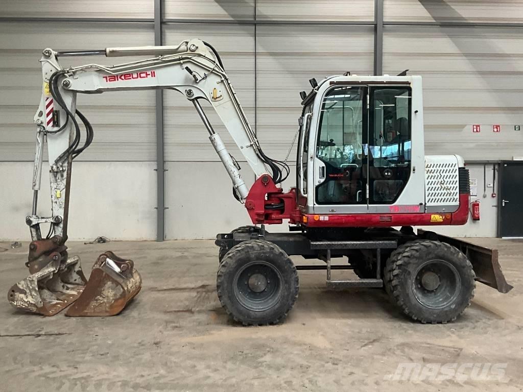 Takeuchi TB 175 W حفارات بعجل