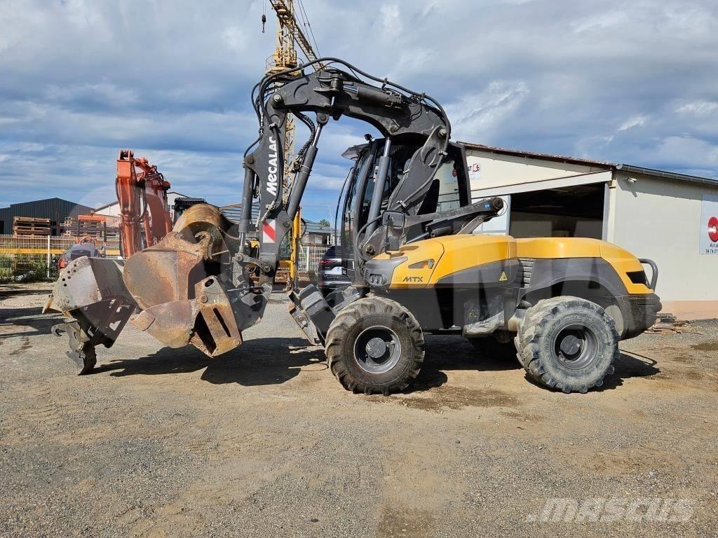 Mecalac 12 MTX حفارات بعجل