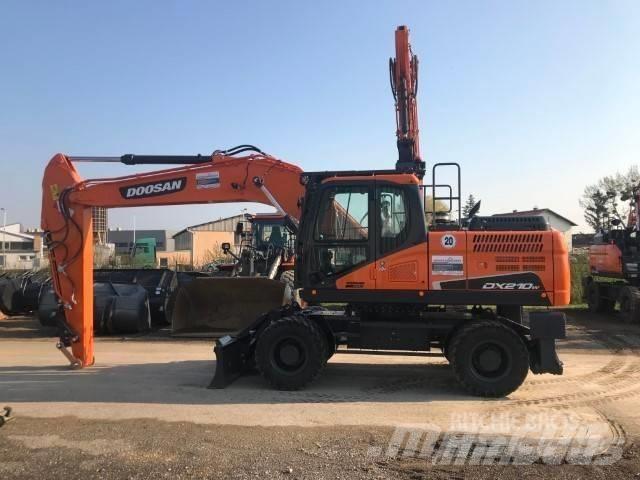 Doosan DX 210 W حفارات بعجل