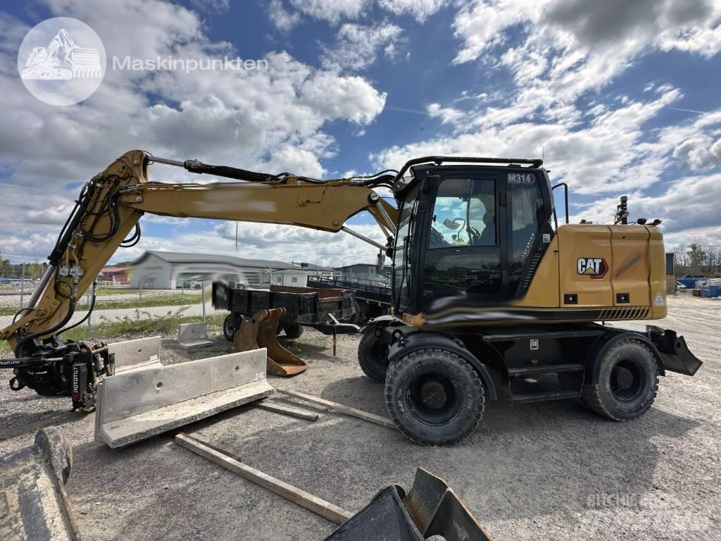 CAT M 314 حفارات بعجل