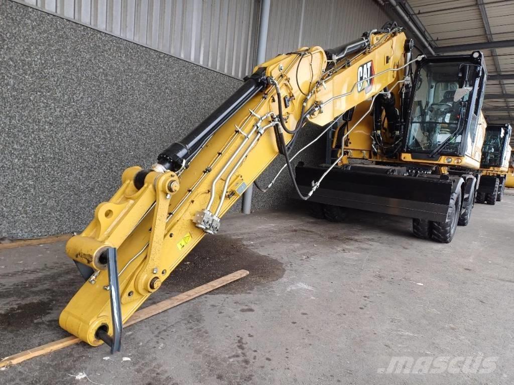 CAT M 320 حفارات بعجل