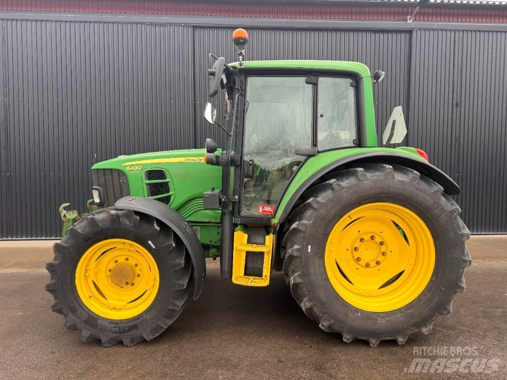 John Deere 6430 الجرارات