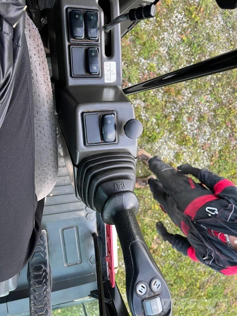 CAT M 314 F حفارات بعجل