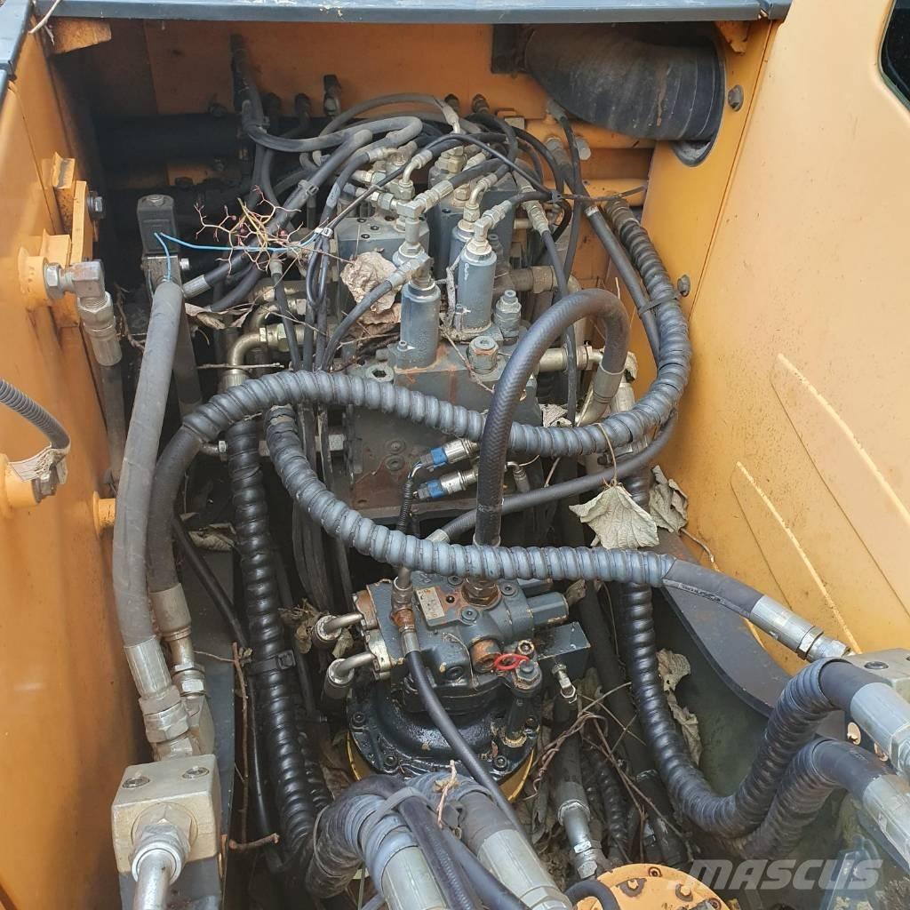 Hyundai Robex 140 W حفارات بعجل