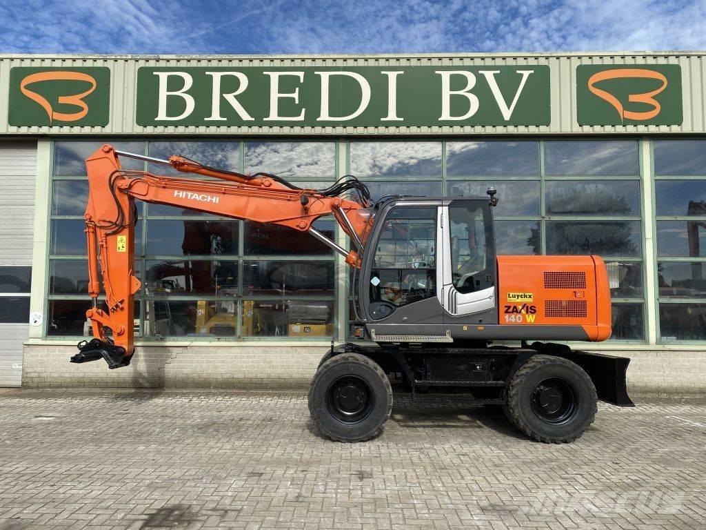 Hitachi ZX 140 W-3 حفارات بعجل