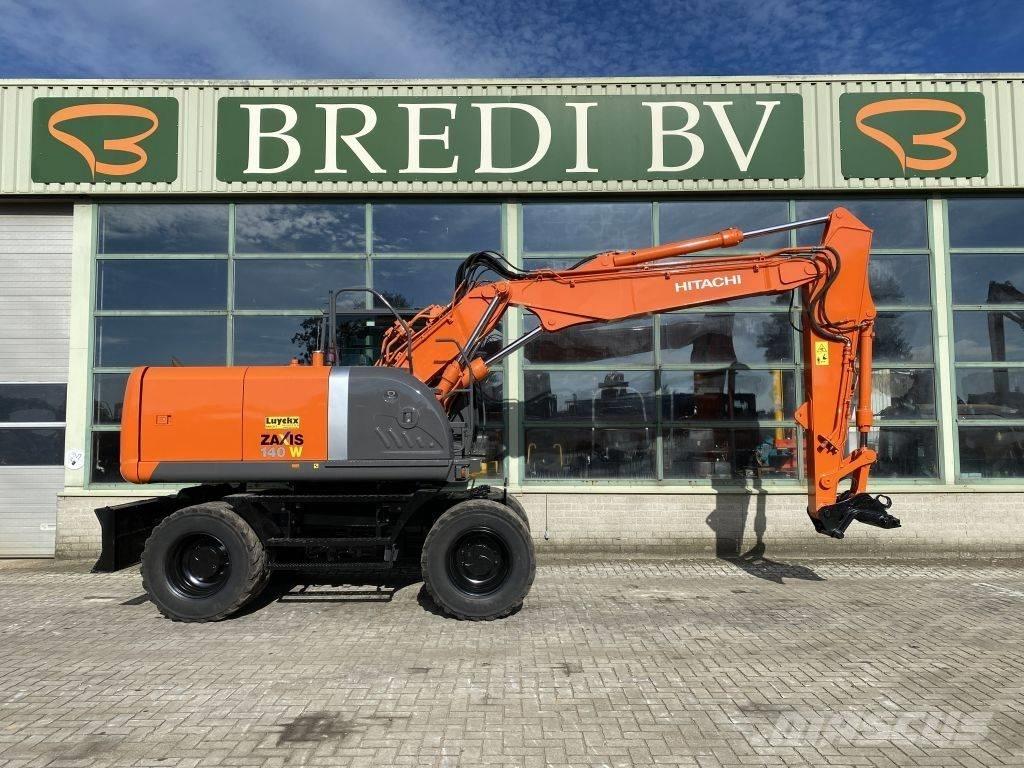 Hitachi ZX 140 W-3 حفارات بعجل